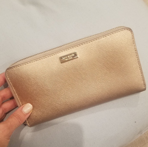 kate spade Handbags - Kate Spade gold leather wallet, Laurel Way